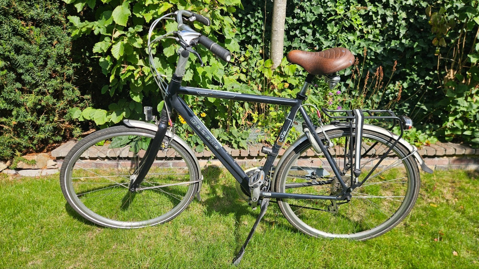 Gazelle Medeo Lite herenfiets, Fietsen en Brommers, Gebruikt, Velgrem, Versnellingen, Ophalen of Verzenden