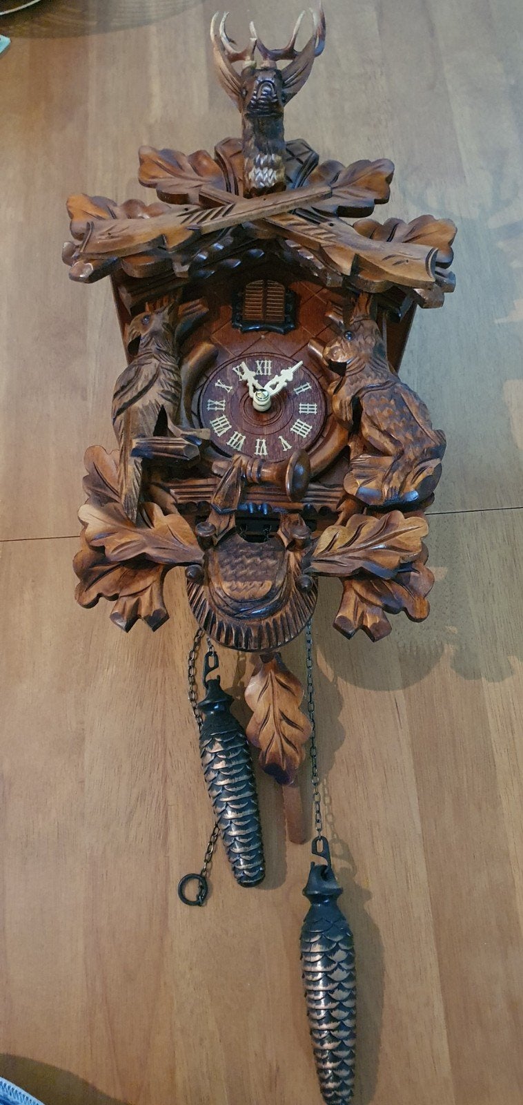 koekoeks klokken, Ophalen, Wandklok