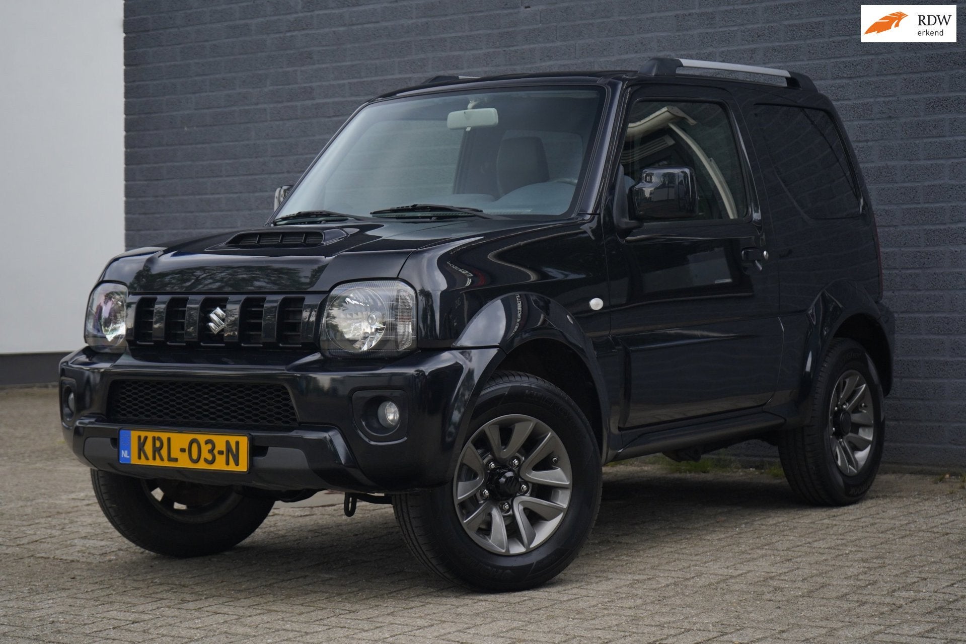 Suzuki JIMNY 1.3 Exclusive, Leer, Airco, NAP, Euro 5, Gebruikt, Zwart, 4 stoelen