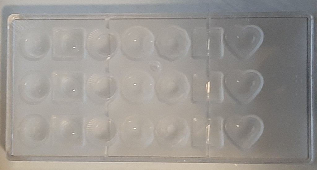 🍫Nieuw: Polycarbonaat bonbonvorm + GRATIS boek🏷️€18,-, Ophalen of Verzenden, Nieuw, Taarten of Cupcakes, Overige typen