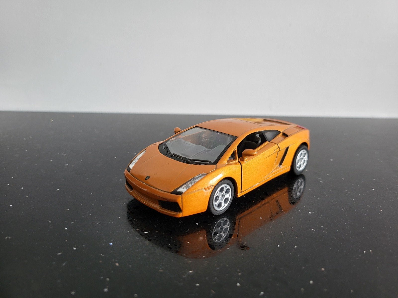 Lamborghini Gallardo oranje 1/43 Bburago, Ophalen of Verzenden, Zo goed als nieuw, Auto, Overige merken