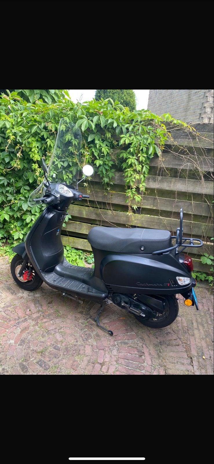 Zwarte Retro scooter DJJD, Ophalen, Gebruikt, Benzine, Maximaal 25 km/u