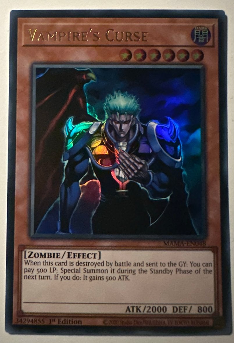 Yu-Gi-Oh! Vampire’s Curse MAMA 1st Edition !, Ophalen of Verzenden, Zo goed als nieuw, Losse kaart, Foil