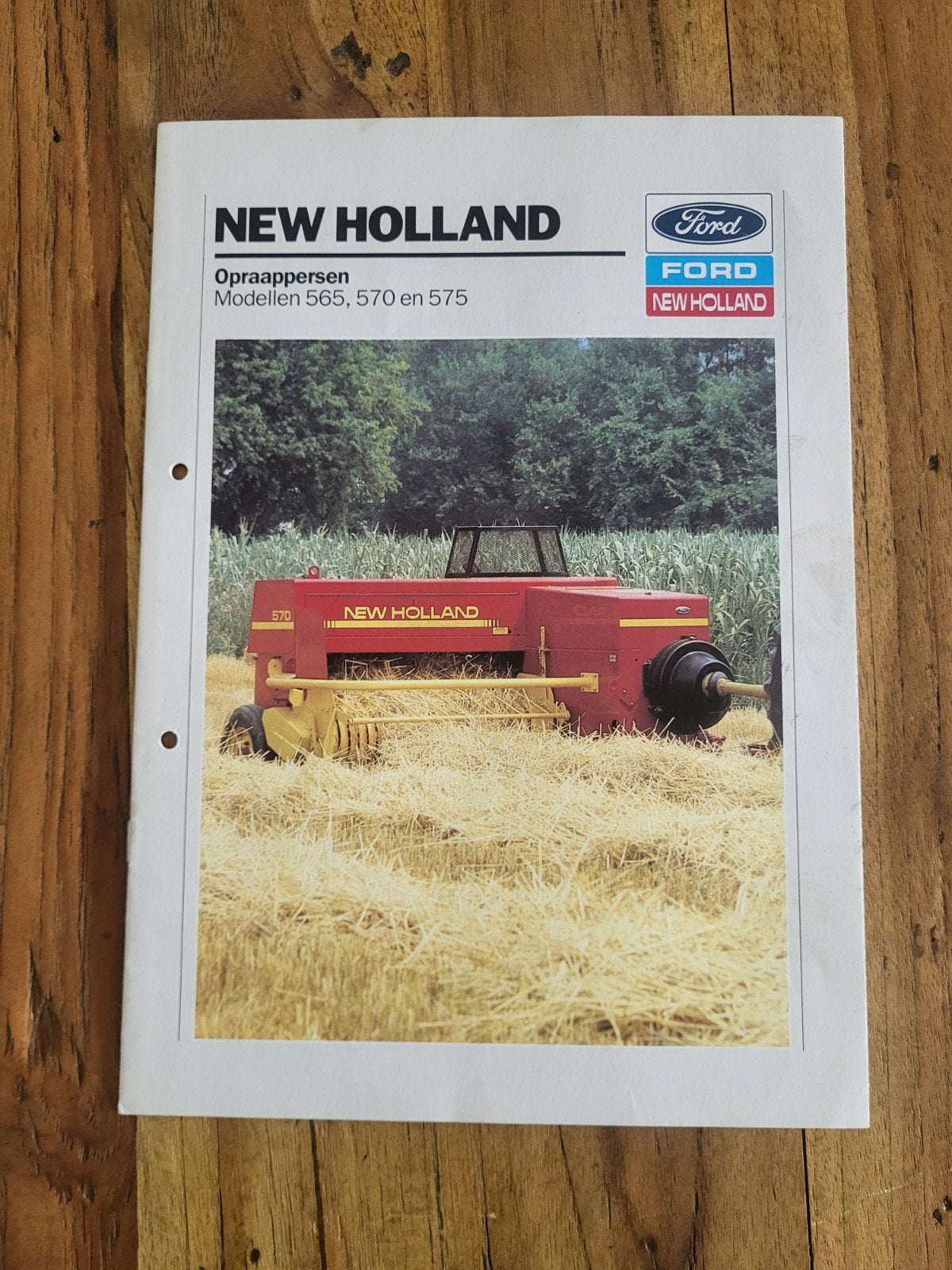 tractor folder New Holland 565 570 575 opraappersen, Boeken, Catalogussen en Folders, Ophalen of Verzenden, Zo goed als nieuw