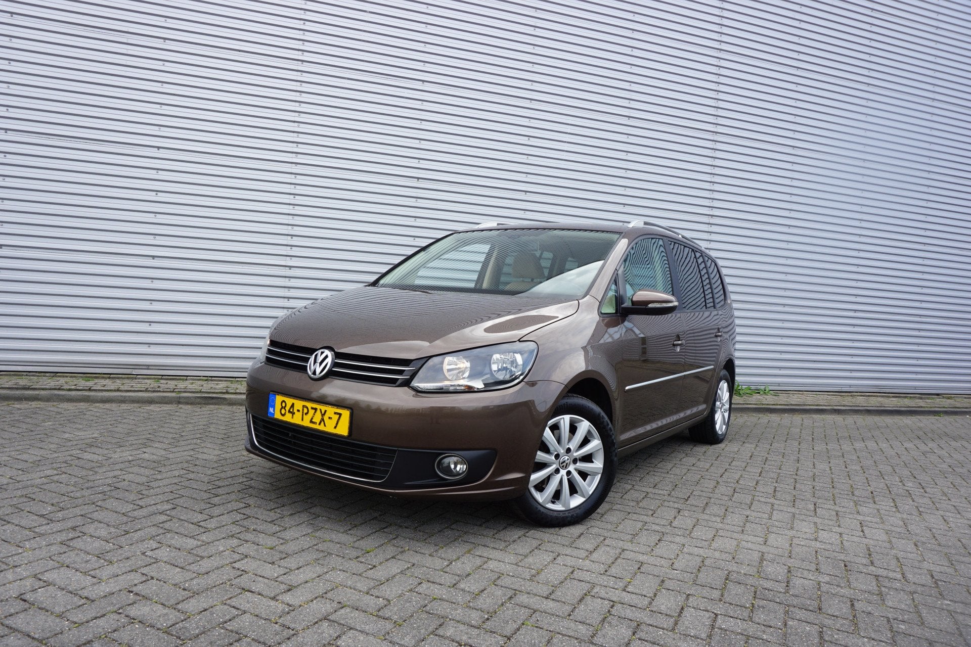 Volkswagen Touran 1.2 TSI Highline BlueMotion Airco / Navi /, Euro 5, Gebruikt, 4 cilinders, Bruin