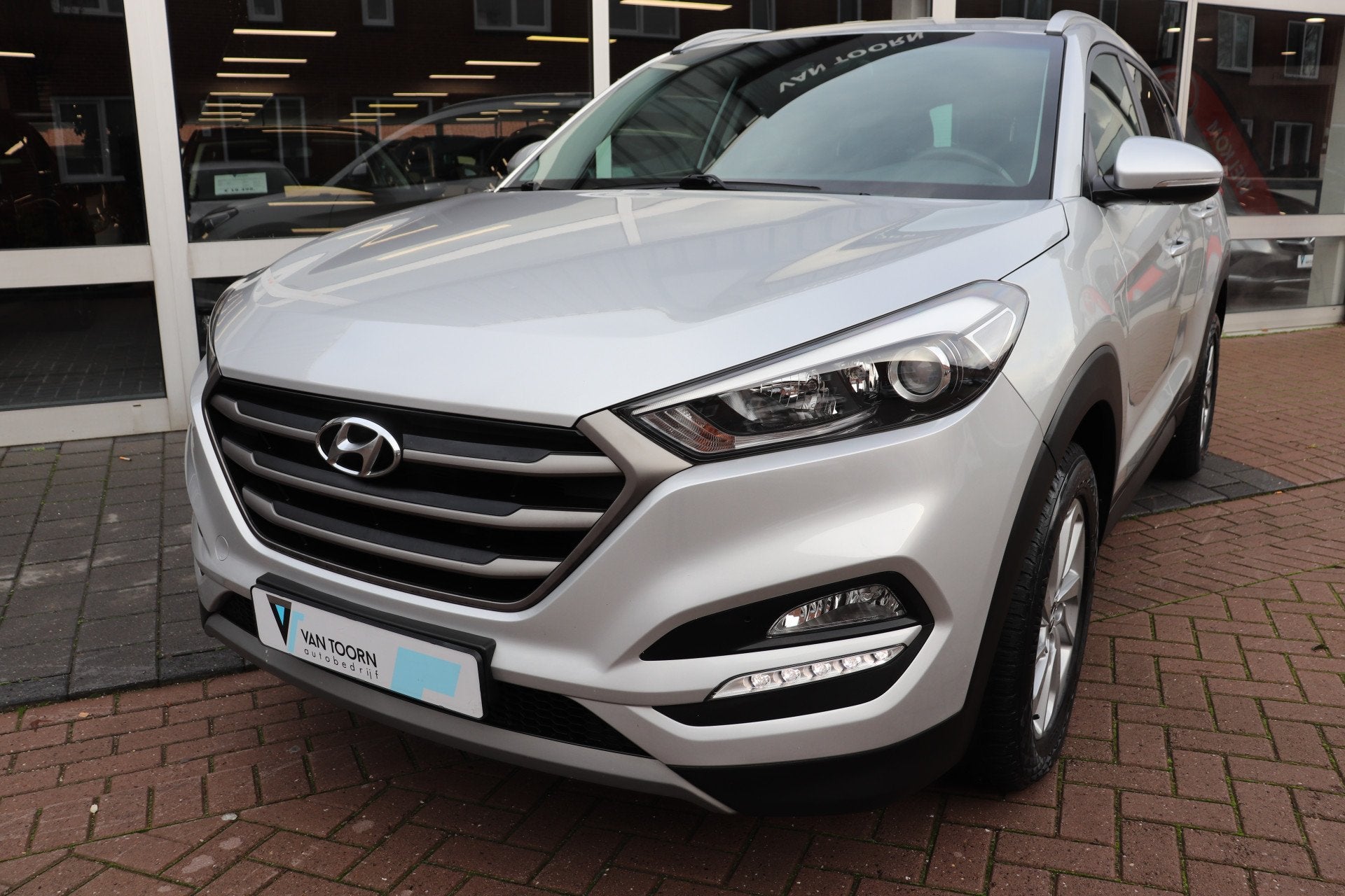 Hyundai Tucson 1.6 GDi Anniversary Edition. navigatie | PDC, Stof, Gebruikt, 4 cilinders, 132 pk