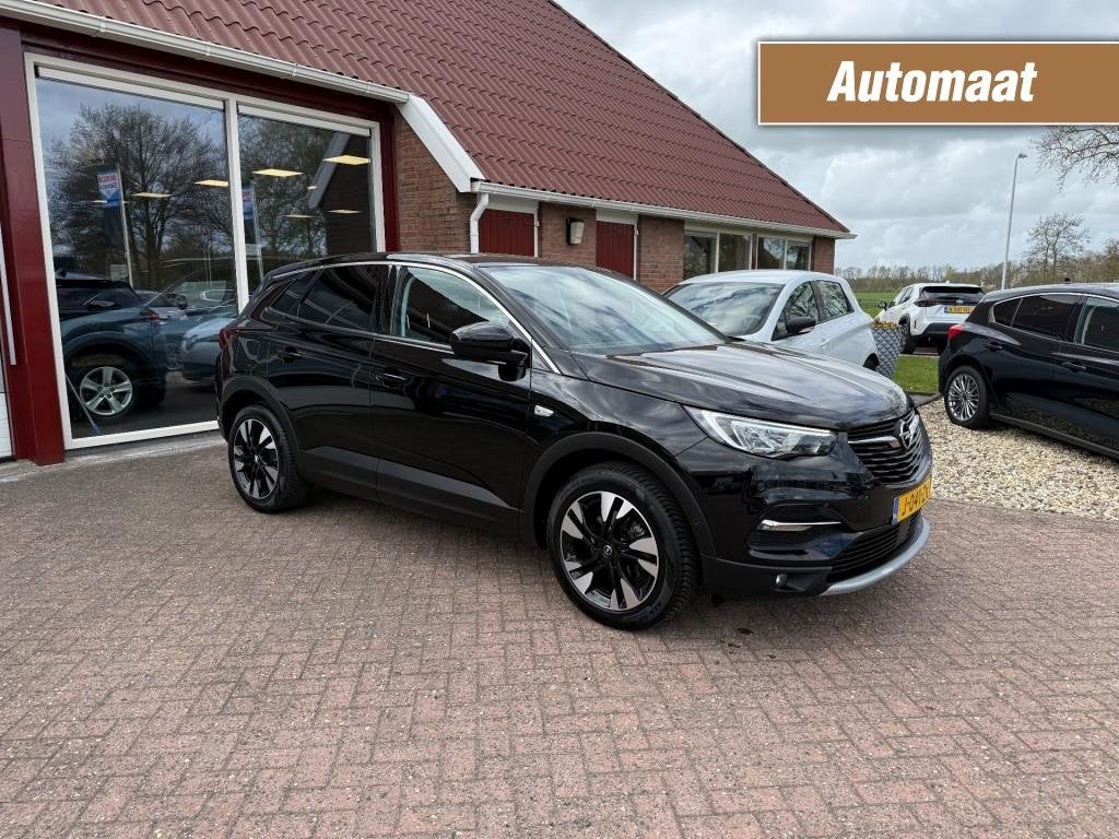Opel GRANDLAND X 1.2 TURBO INNOVATION TREKHAAK/Camera/CRUISE, Auto's, Opel, Gebruikt, 1199 cc, Met garantie (alle), Zwart
