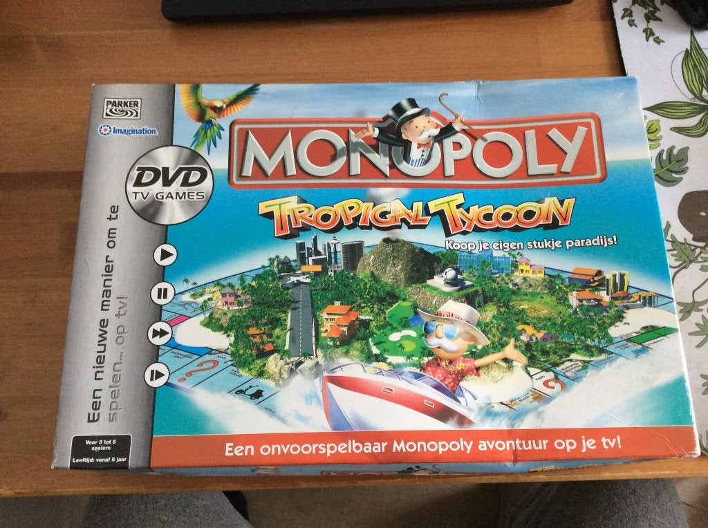Monopoly Tropical Tycoon. met DVD. Bordspel van Parker, Vijf spelers of meer, Ophalen of Verzenden, Parker