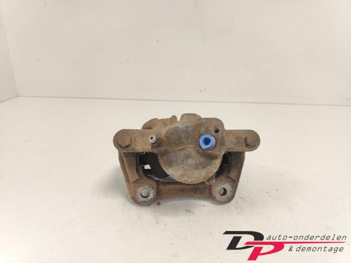 Remklauw (Tang) links-voor van een Nissan Note, Gebruikt, -, -, Ophalen of Verzenden