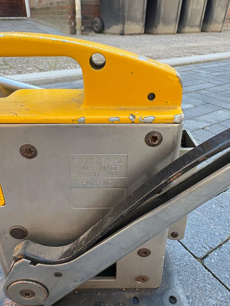 StrapEx omsnoeringsapparaat met bandafroller, Ophalen