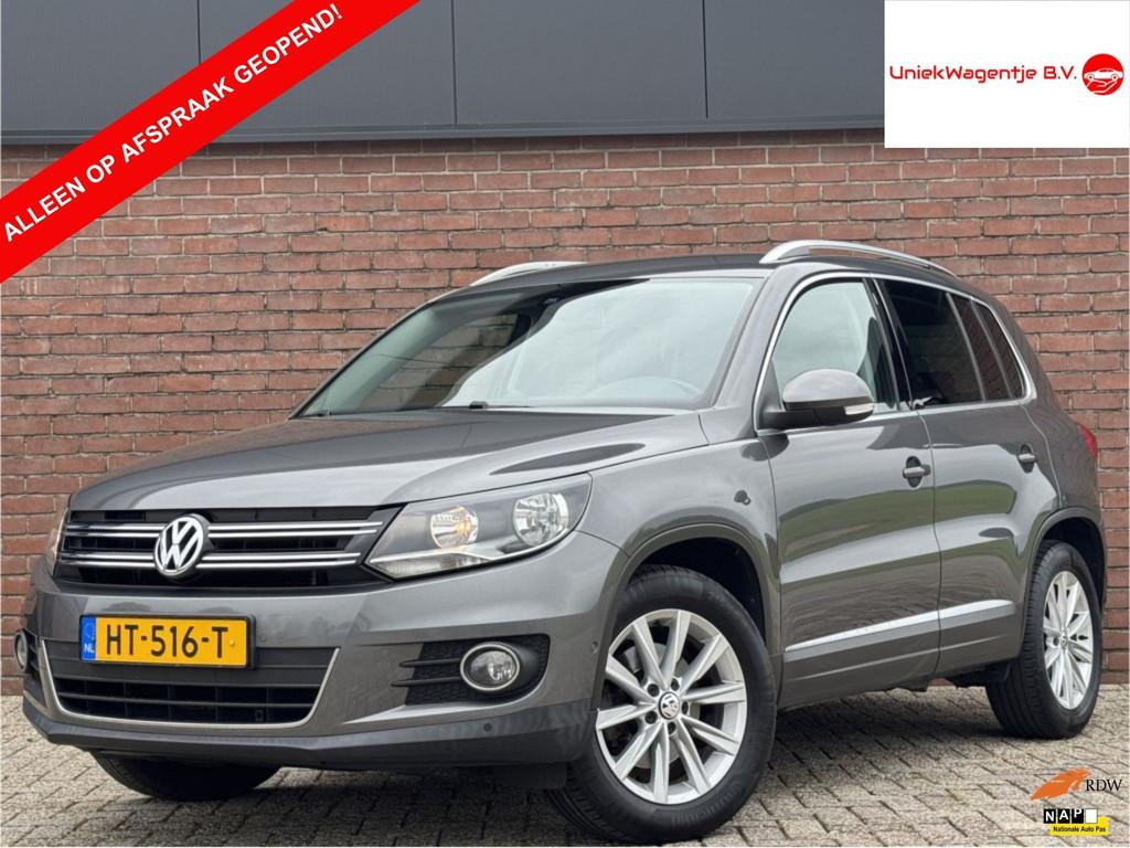 Volkswagen Tiguan 1.4 TSI SPORT&STYLE | NL-AUTO! | DEALER OH, Auto's, Volkswagen, Voorwielaandrijving, Euro 5, 15 km/l, Gebruikt