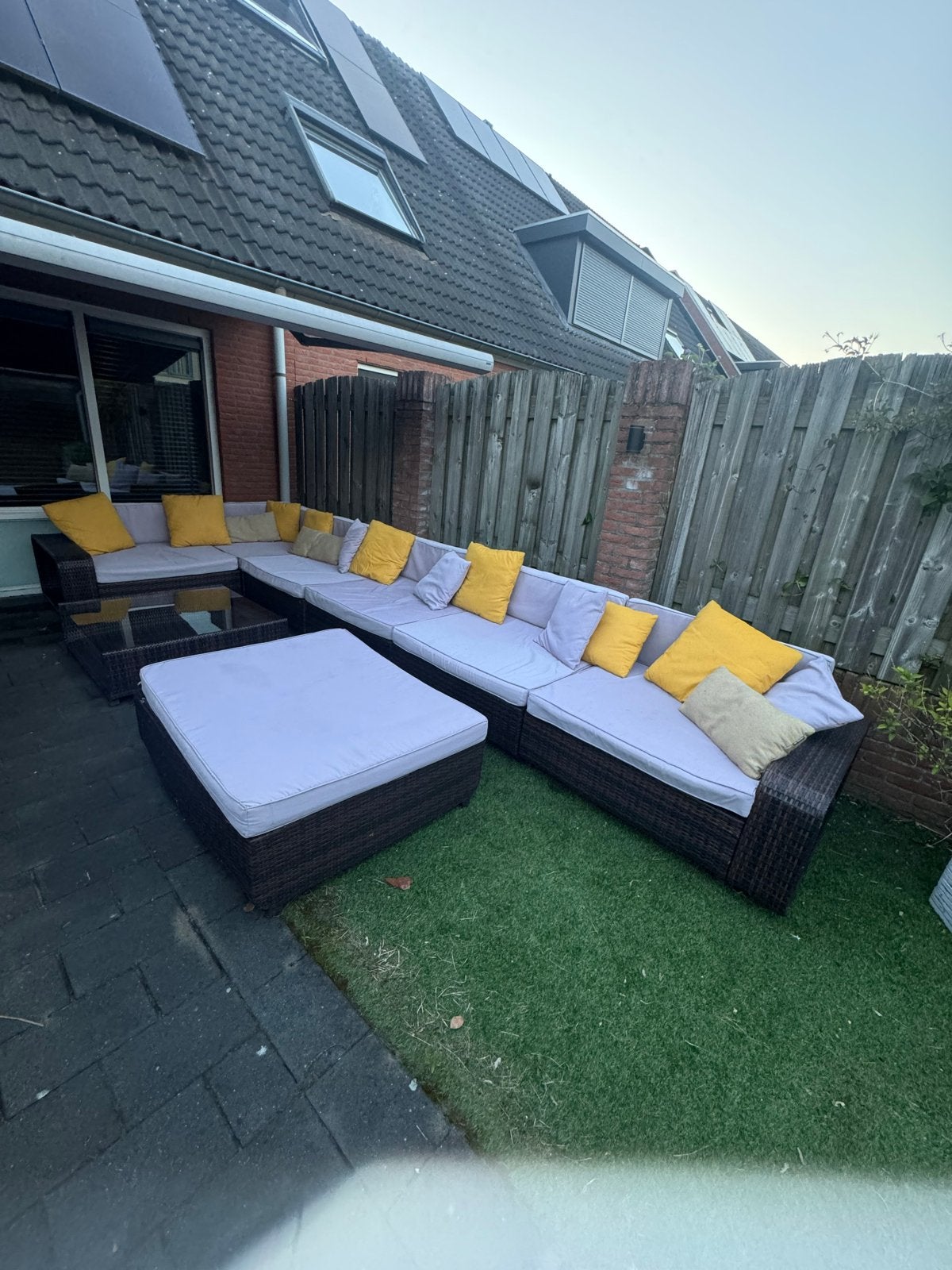 Grote wicker Loungeset met Glazen Tafel en Hocker, Tuin en Terras, Tuinsets en Loungesets, Ophalen, Overige materialen, Gebruikt