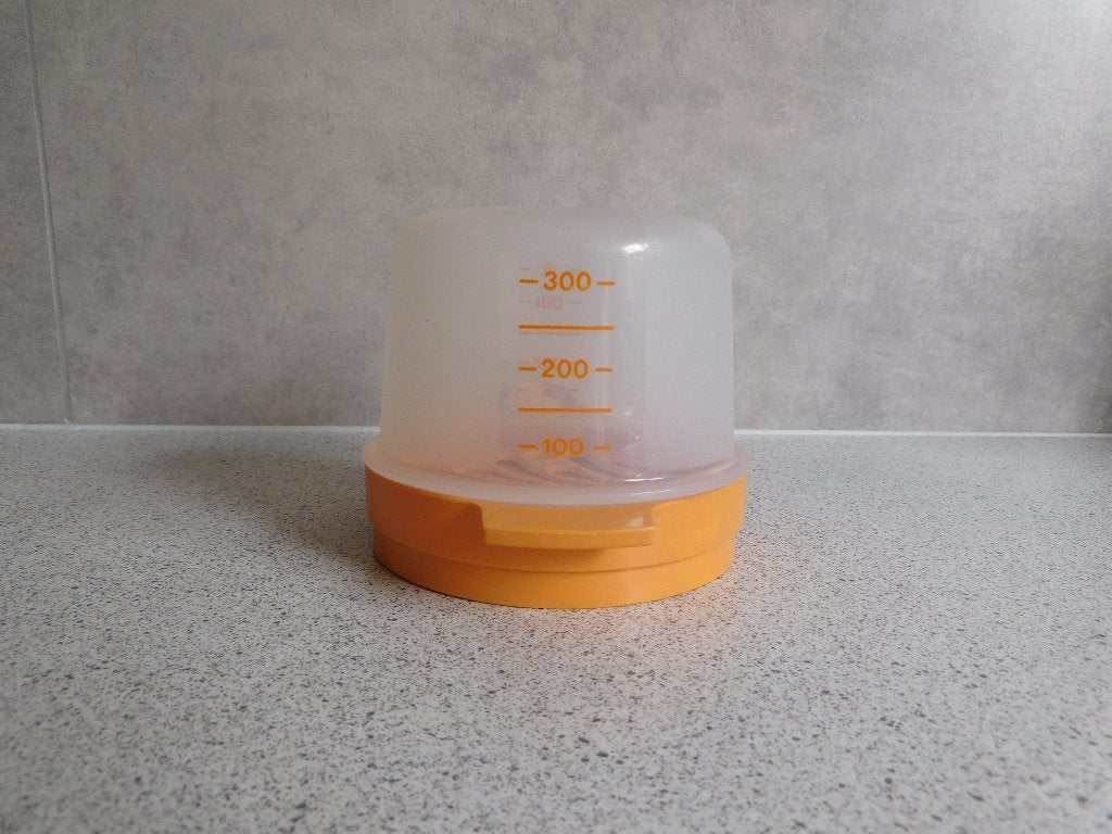 Tupperware Keukenhulpje Handknijpzeef Oranje, Ophalen of Verzenden, Zo goed als nieuw, Oranje, Overige typen