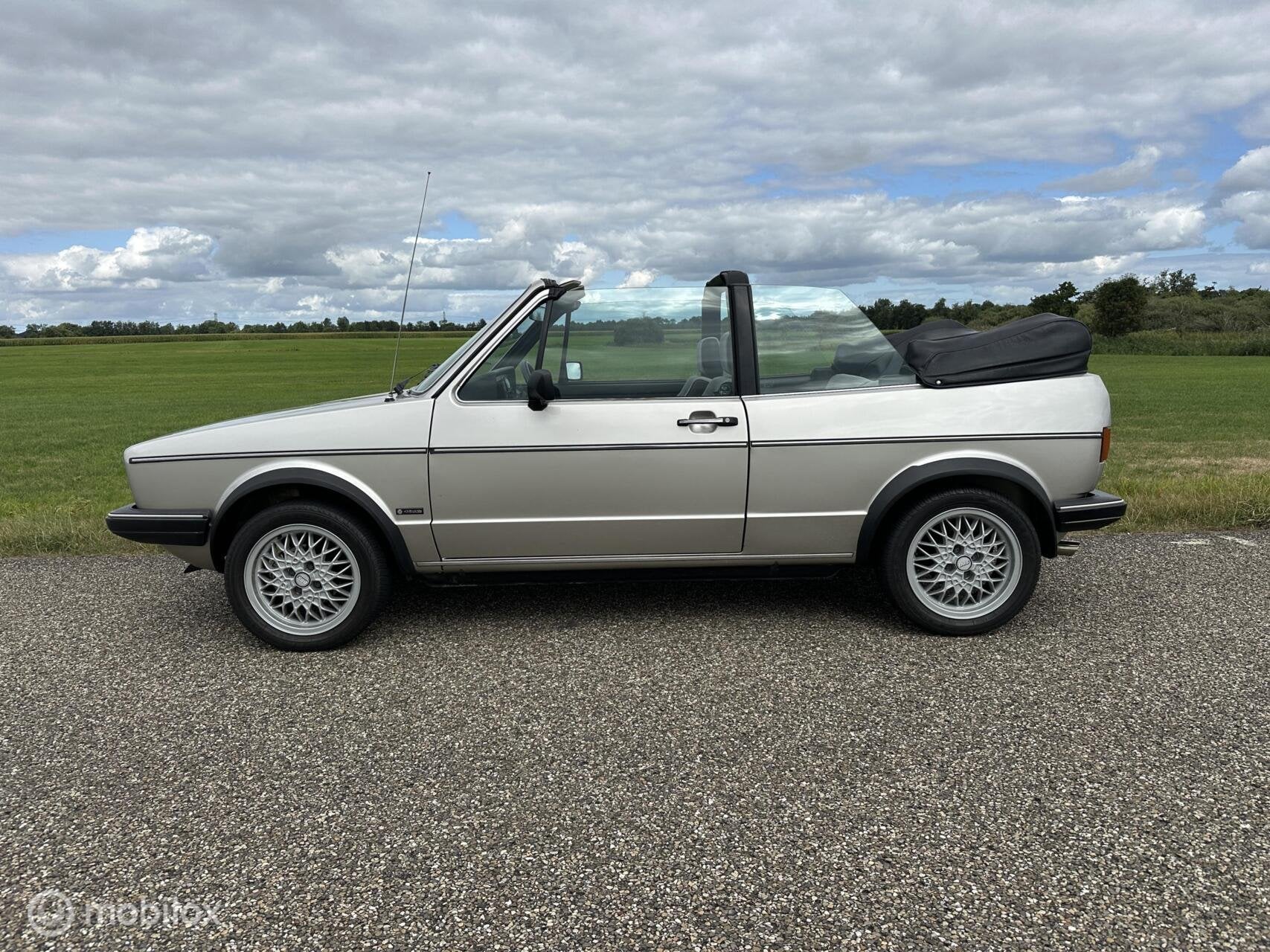 Golf Cabriolet met 59.472KM!, Auto's, Stof, Cabriolet, Volkswagen, Bedrijf