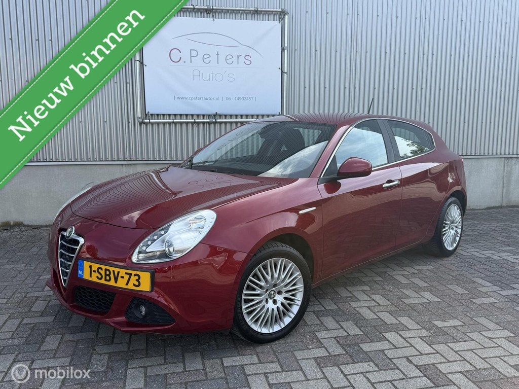 Alfa Romeo Giulietta 1.4 T Distinctive Automaat 2012 / Clima, Auto's, Alfa Romeo, Euro 5, Stof, 4 cilinders, Bedrijf