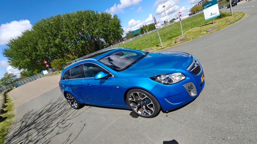 Opel Insignia OPC Sports Tourer 4X4 2011 Blauw, Zwart, Blauw, Leder, Handgeschakeld
