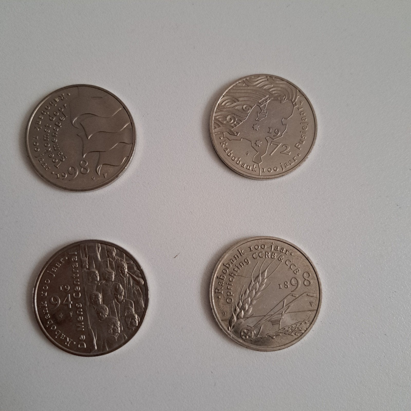 Set van (i) Vier herdenkingsmunten 100 jaar Rabobank, Ophalen, Losse munt