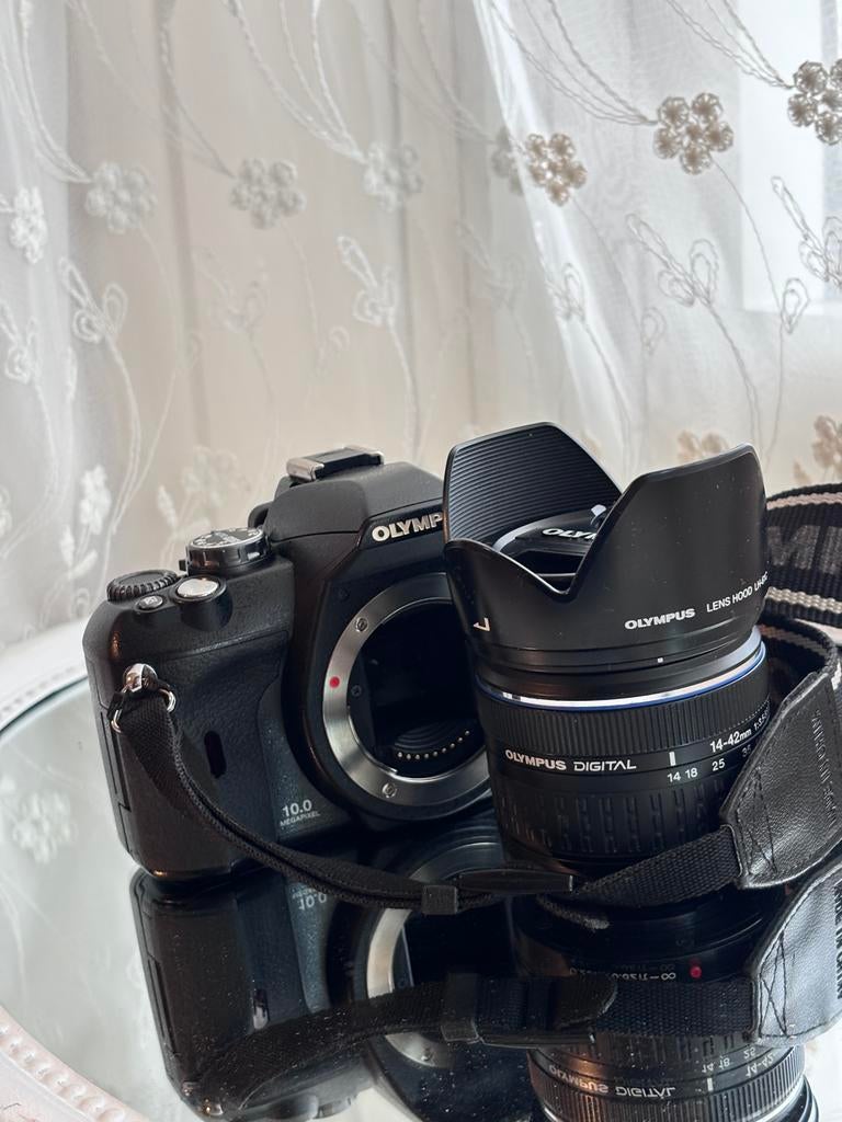 Olympus E-400 Spiegelreflexcamera met 14-42mm lens, Ophalen of Verzenden, Zo goed als nieuw