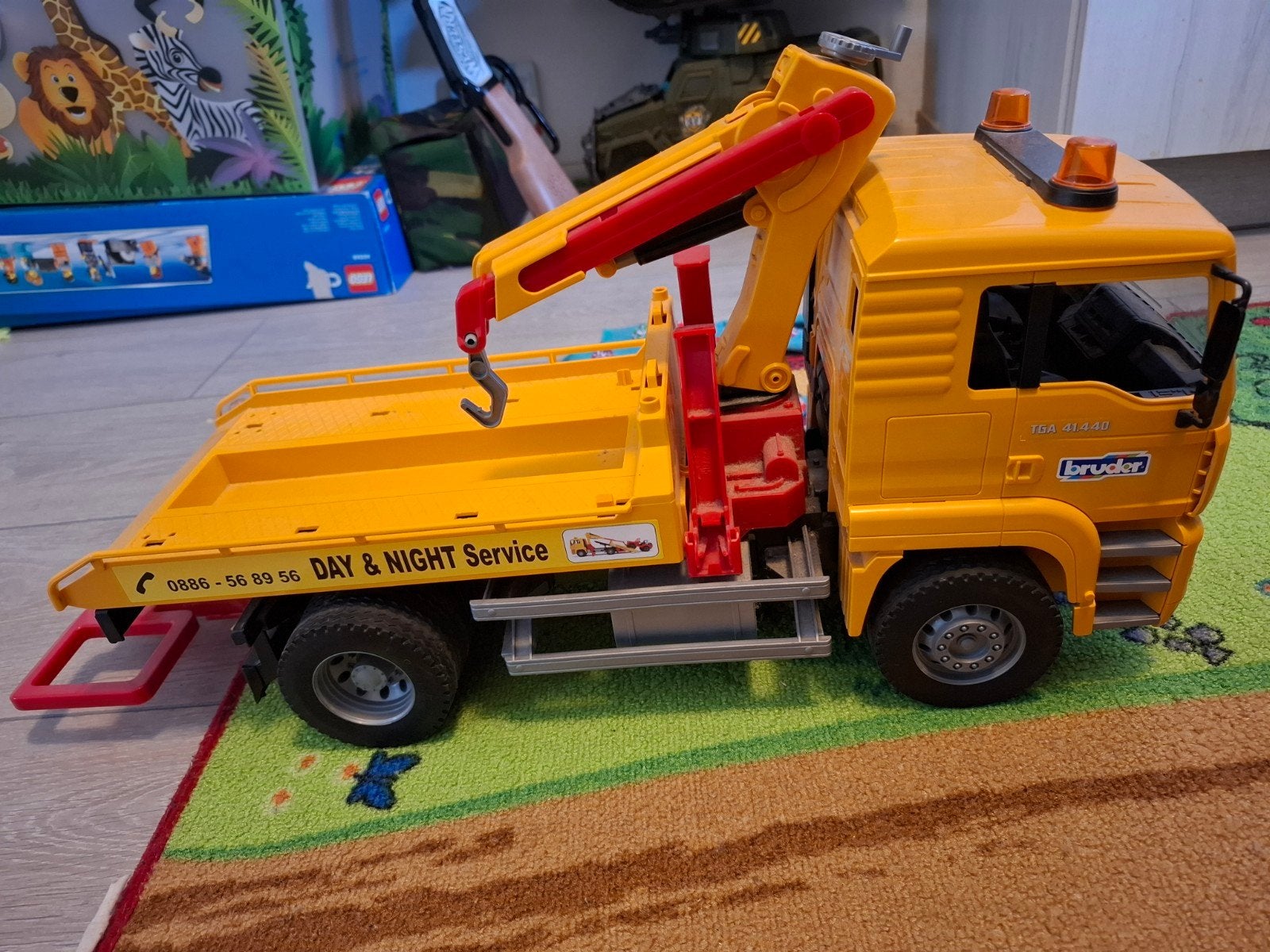 Bruder MAN Autoambulance met kraan, Ophalen of Verzenden, Gebruikt