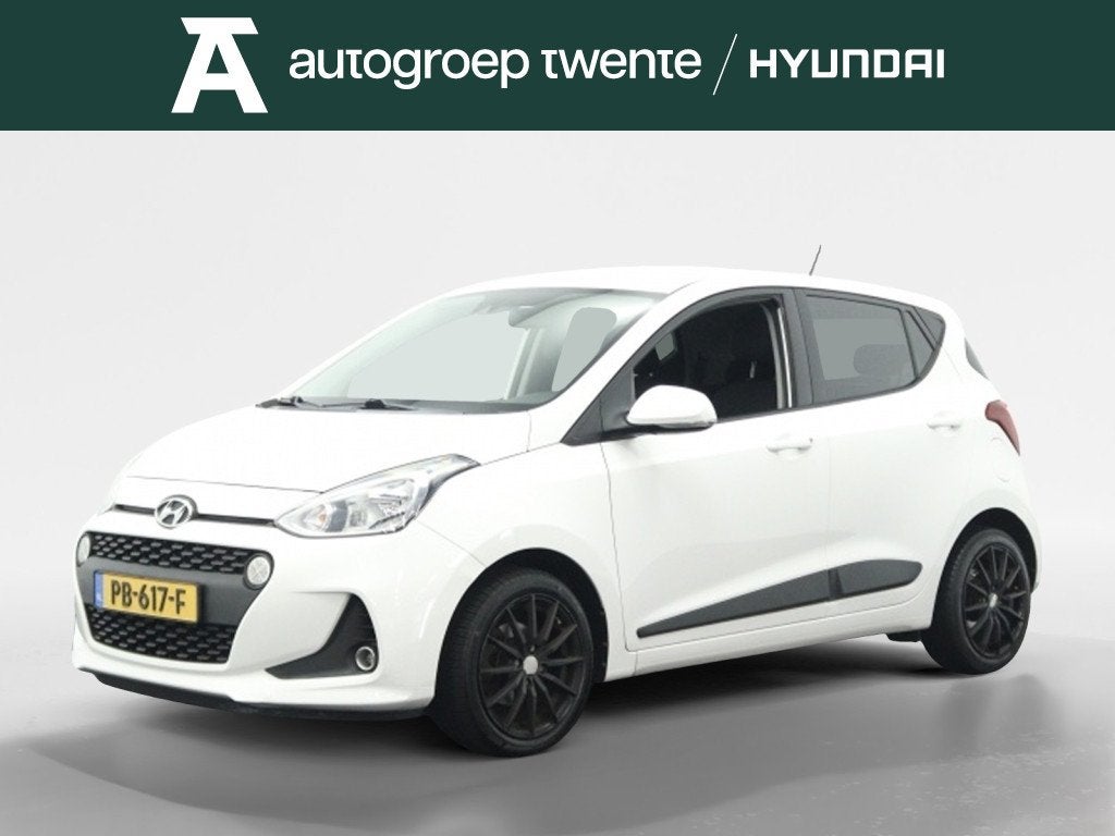 Hyundai i10 1.0i i-Premium | Navigatie | Stoelverwarming | C, Auto's, Keurmerk '100% Onderhouden', 12 maanden, Stof, Gebruikt