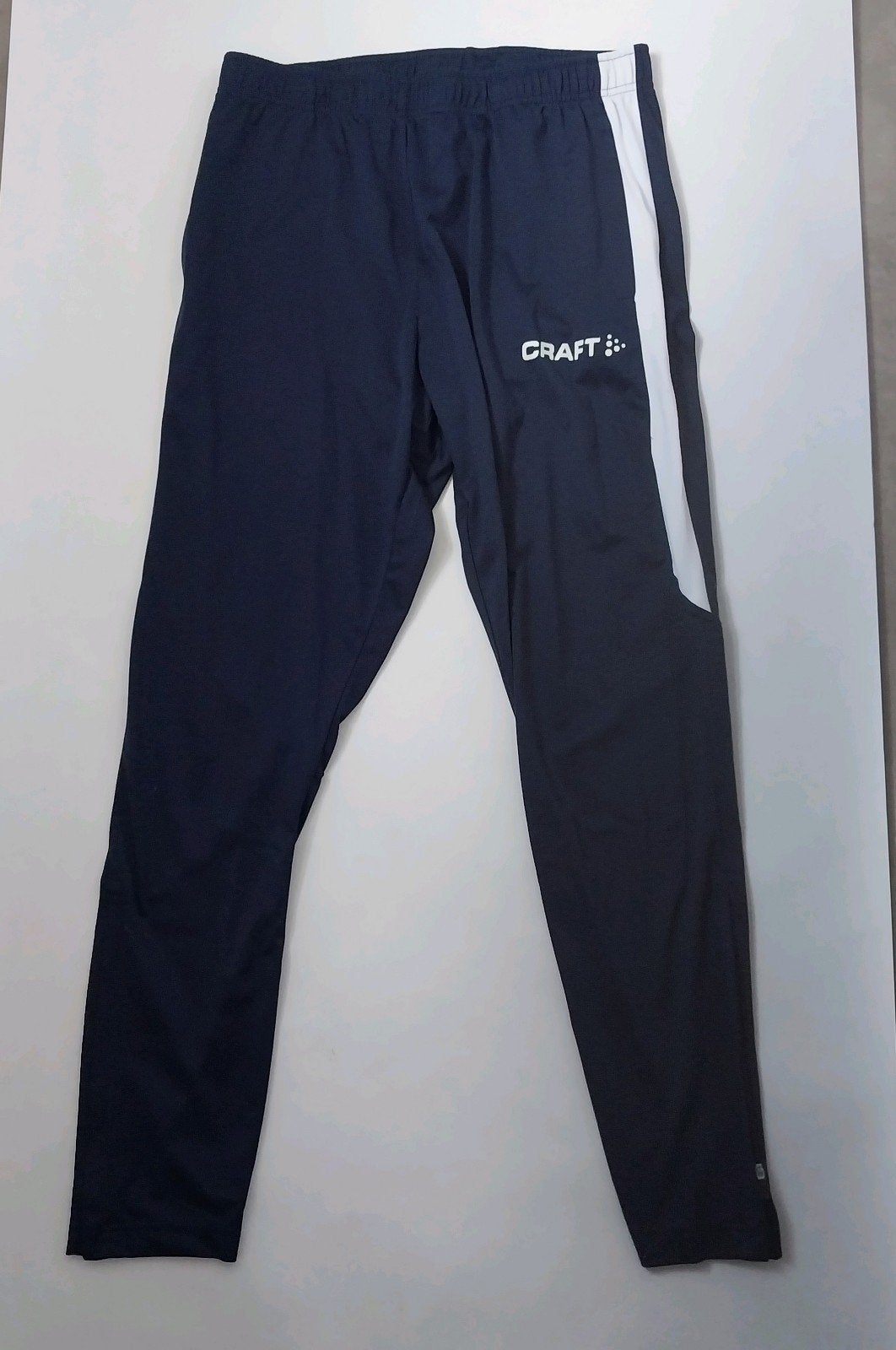 Bijna nieuwe navy sportbroek van Craft - Maat M, Kleding | Heren, Sportkleding, Craft, Ophalen of Verzenden, Zo goed als nieuw