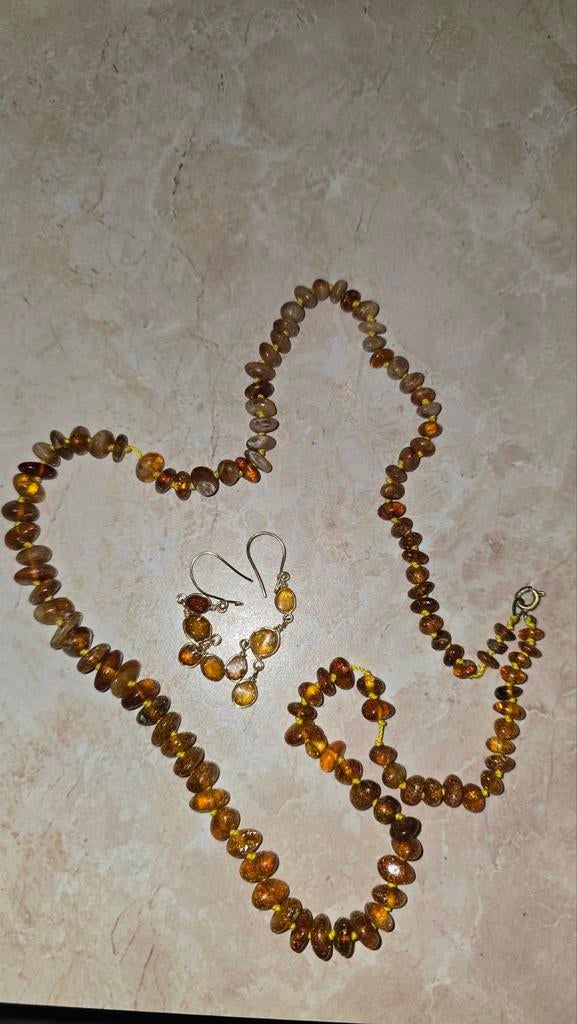 Barnsteen ketting met oor belletjes, Verzenden