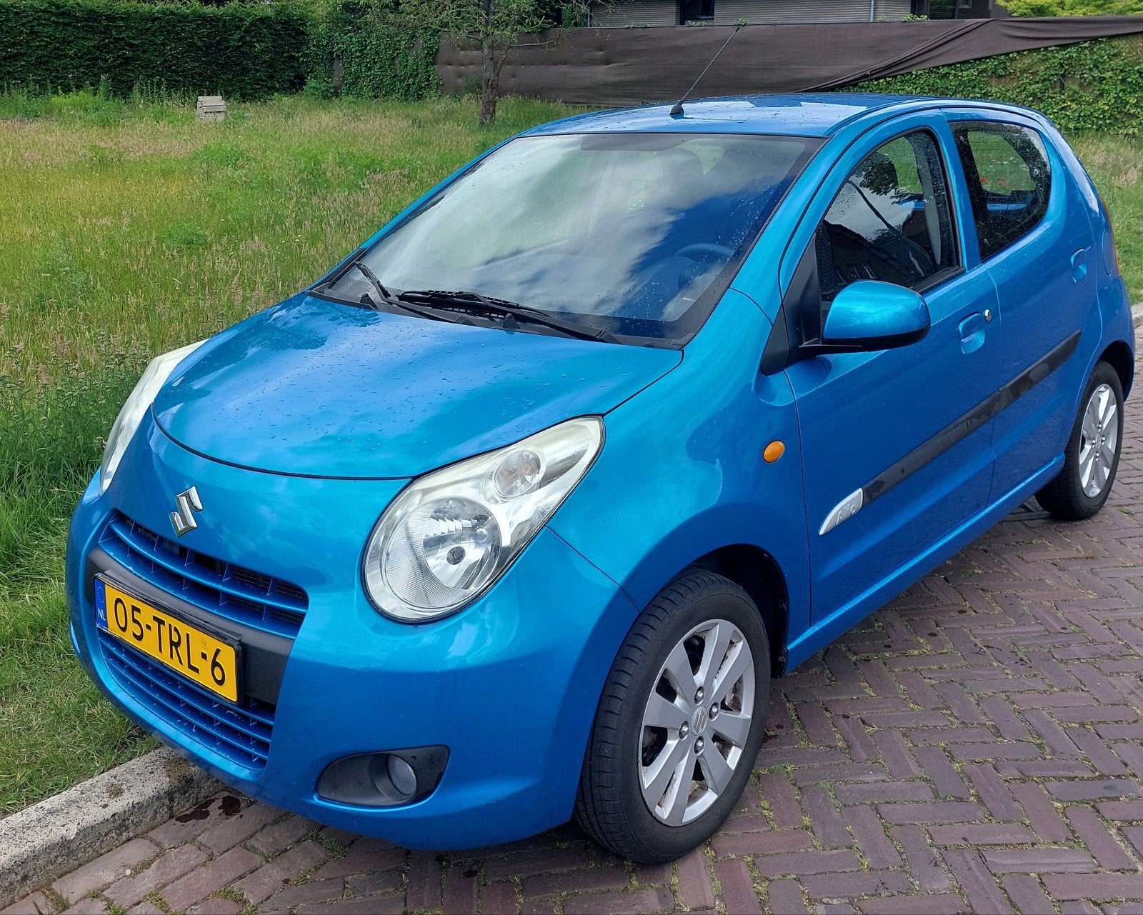 Suzuki Alto 1.0 Exclusive 2012 Blauw, Auto's, Voorwielaandrijving, Euro 5, Stof, 200 kg