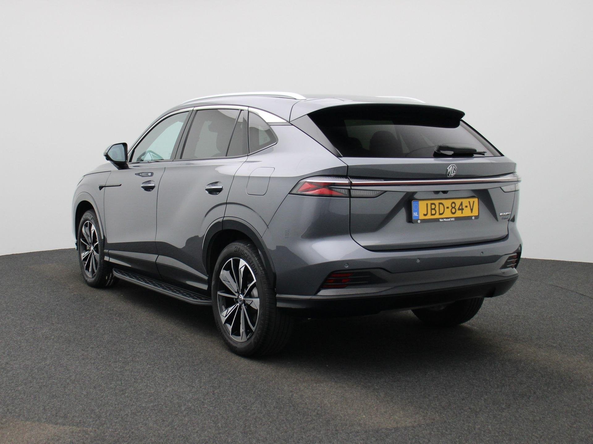 MG HS 1.5 PHEV 272pk Aut. Luxury, Auto's, 12 maanden, Stof, Gebruikt, 4 cilinders