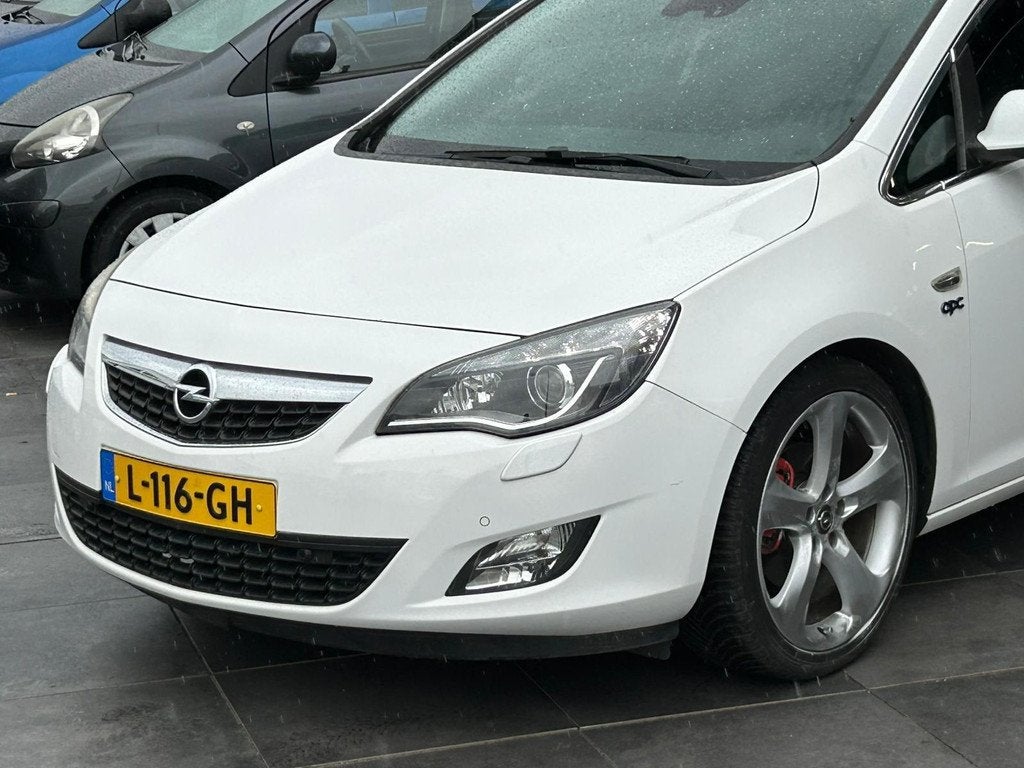 Opel Astra Sports Tourer 1.6 Turbo Sport|Cruise|Stoelvw|PDC, Auto's, Voorwielaandrijving, Euro 5, 730 kg, Gebruikt