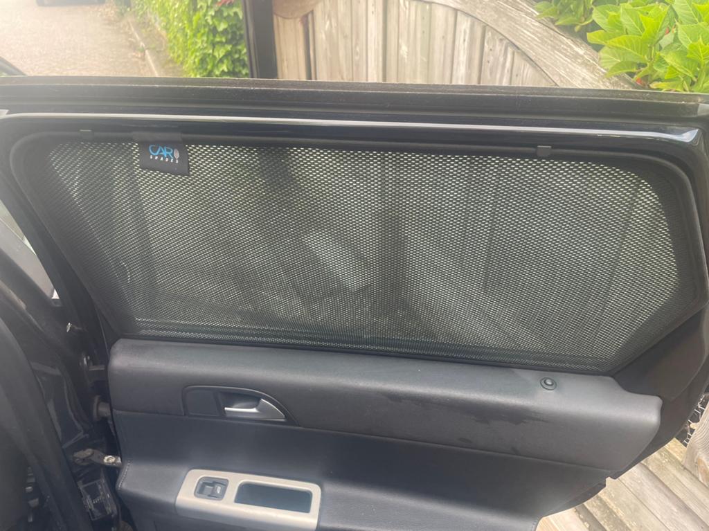 Zonneschermen zijkanten achter Volvo v50, Ophalen, Volvo