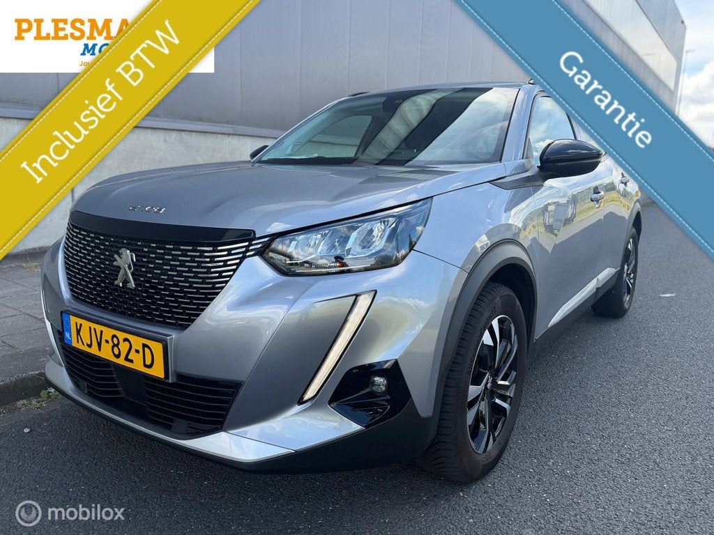 Peugeot 2008 1.2 PureTech Allure Pack Inclusief Garantie!, Gebruikt, Euro 6, 1199 cc, Leder en Stof