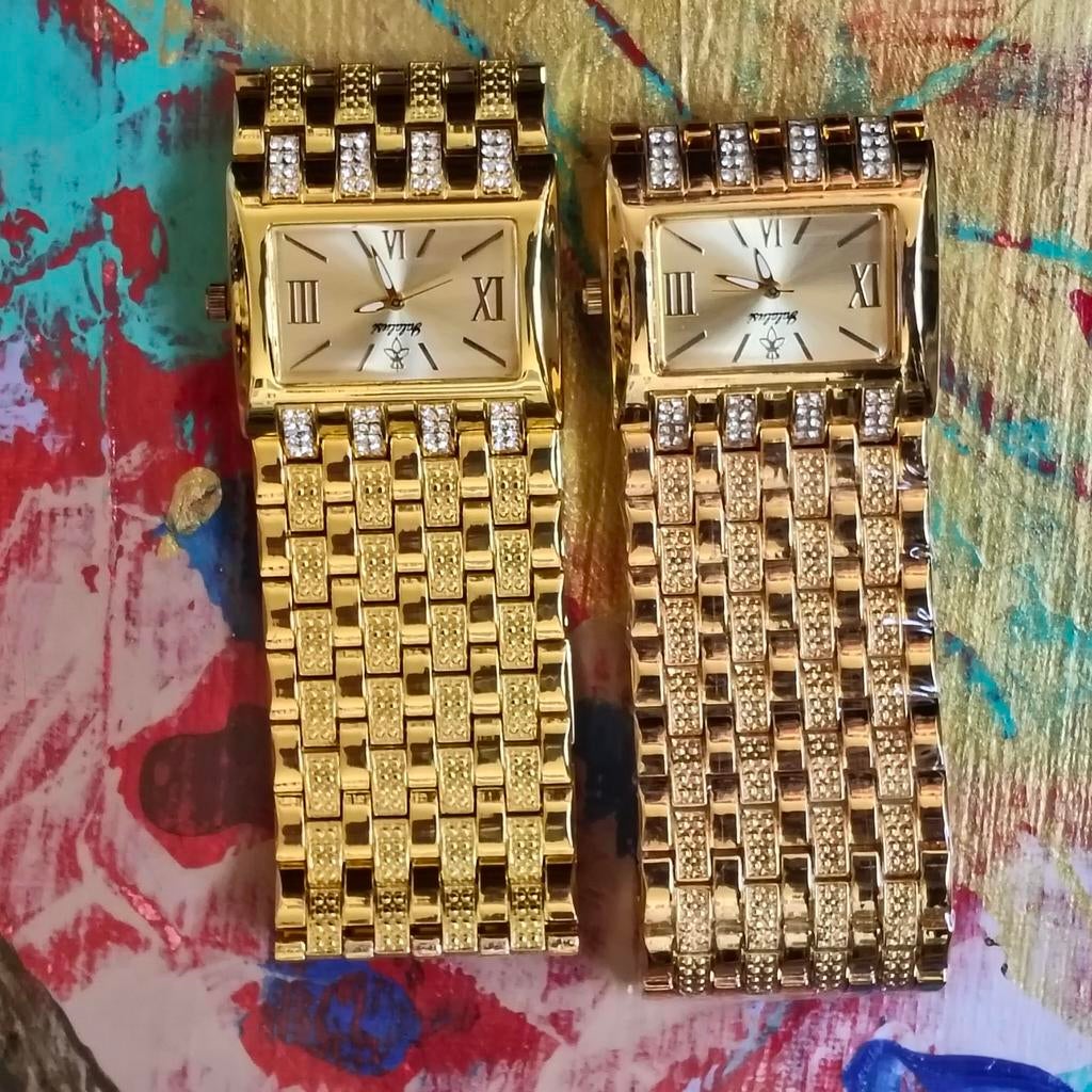Goudkleurig horloge met steentjes, Ophalen