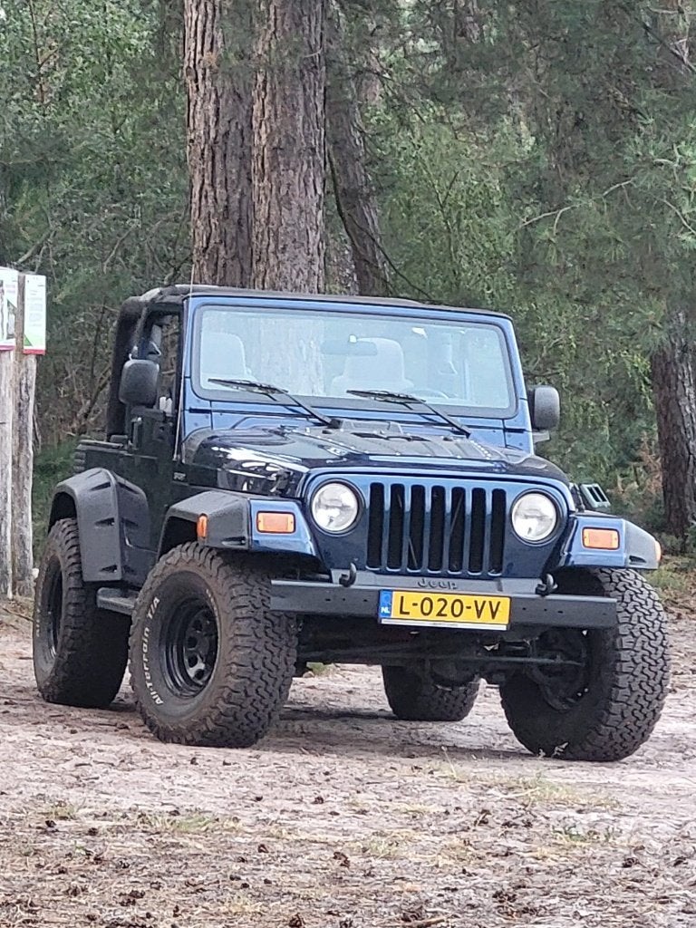Jeep Wrangler 4.0i Aut 4x4 Sport/Airco Lift Kit 2.5 inch, Auto's, Automaat, Stof, Cabriolet, Blauw