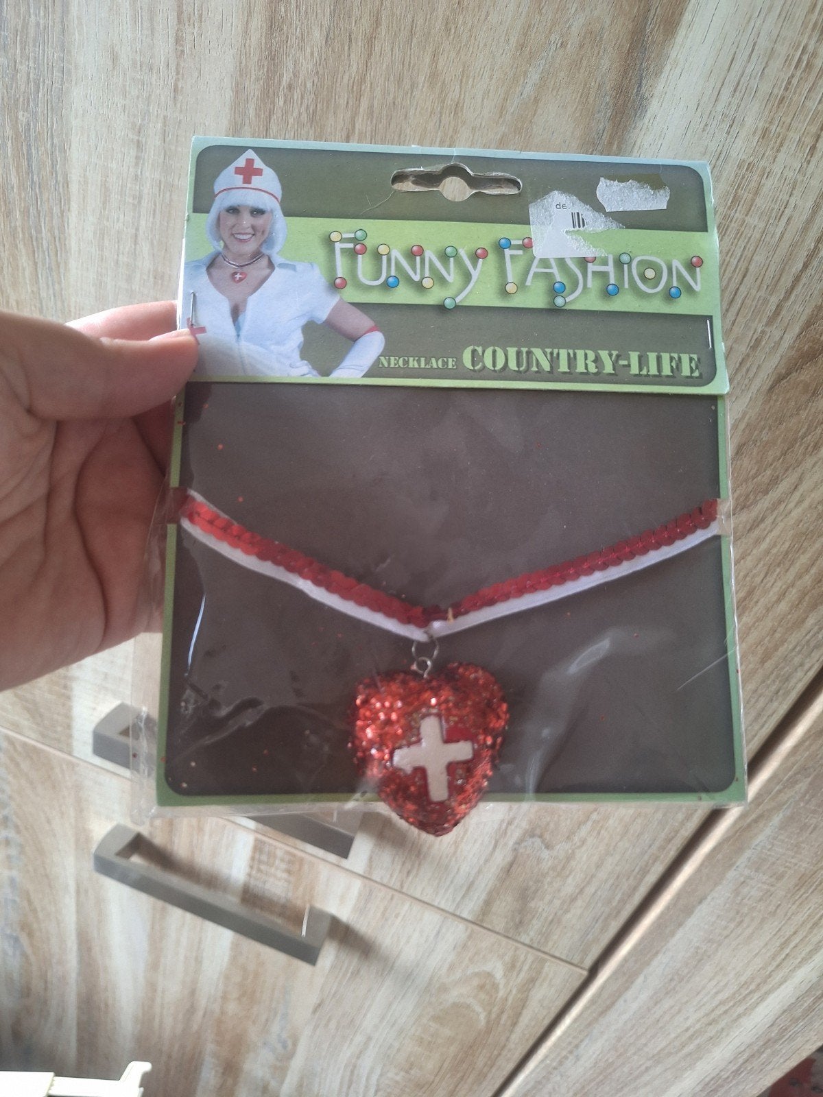Verpleegster ketting - Leuk voor Halloween!, Ophalen of Verzenden, Zo goed als nieuw, Funny Fashion, Accessoires