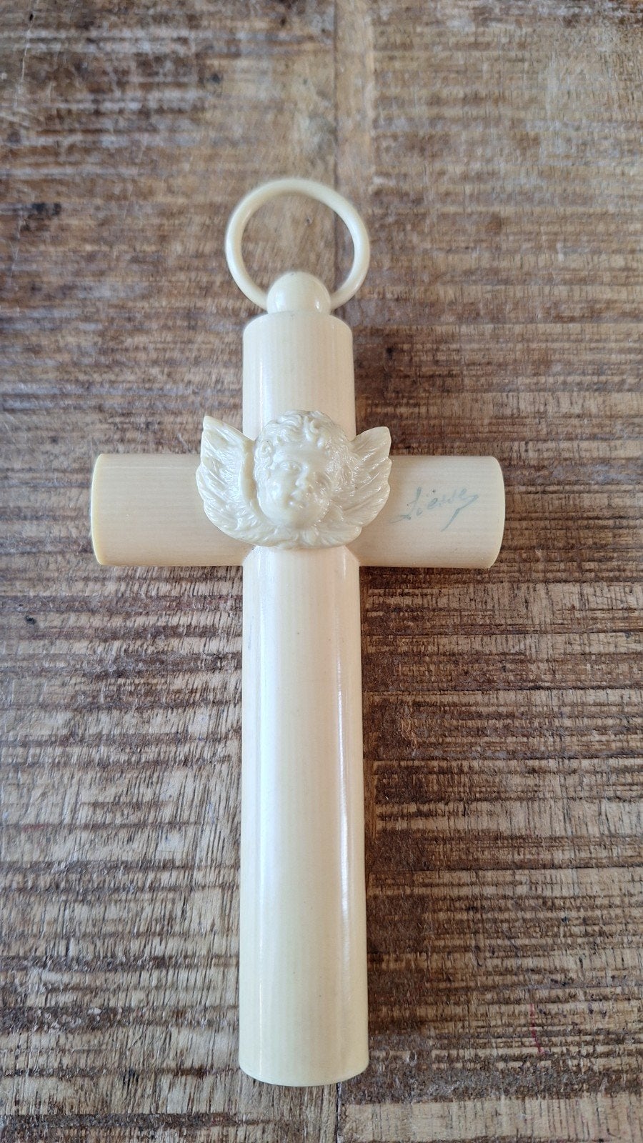 Antieke celluloid wieghanger kruis met engelkopje, Ophalen of Verzenden