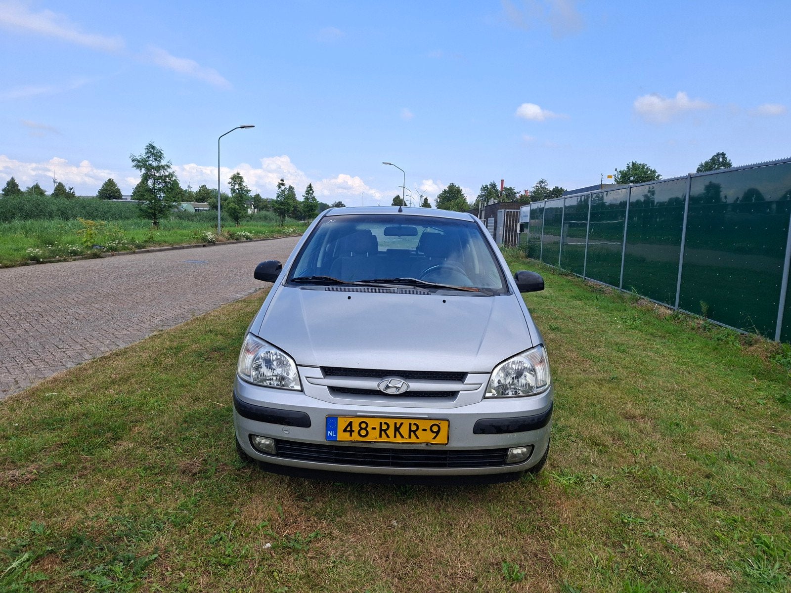 Hyundai Getz 1.1 5DRS 2004 Grijs, Auto's, Hyundai, Bedrijf, Getz, Benzine, B, Hatchback, Handgeschakeld, Geïmporteerd, Zilver of Grijs