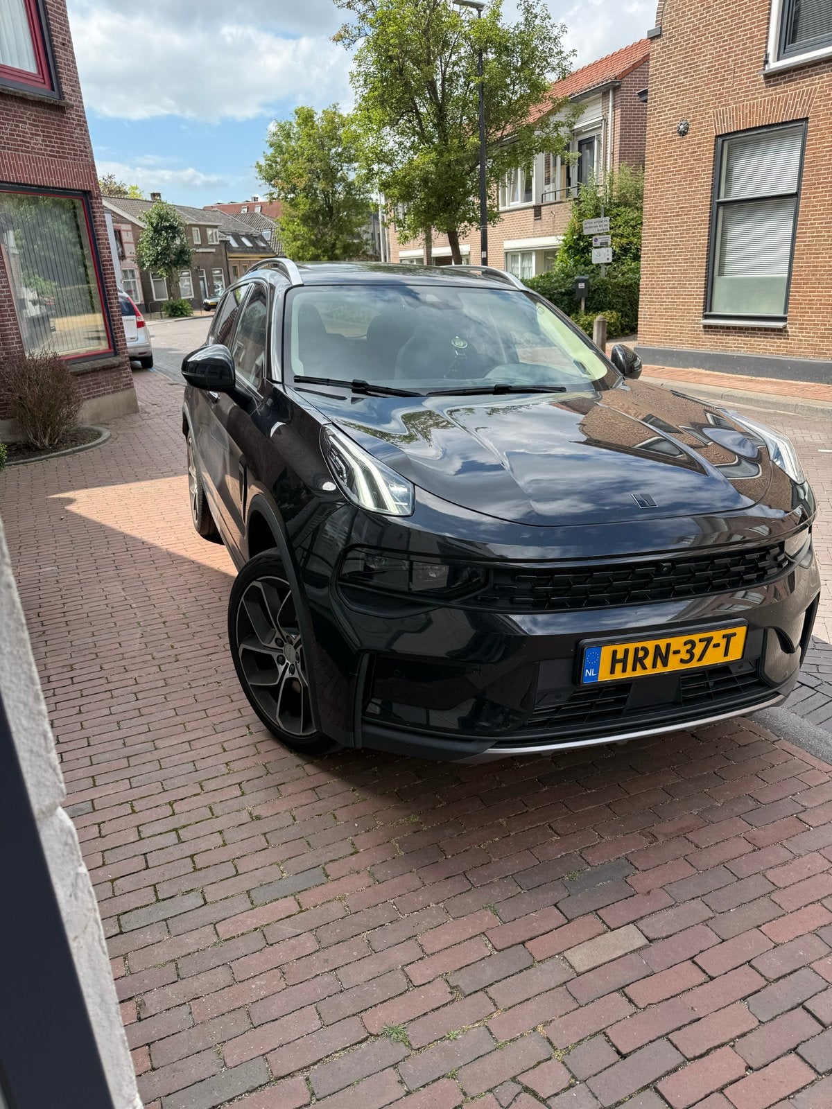 Lynk & Co 1.5TD 261pk Phev 7DCTH 2023 Zwart, Auto's, Lynk & Co, 1800 kg, 179 pk, Zwart, Plug-in hybride