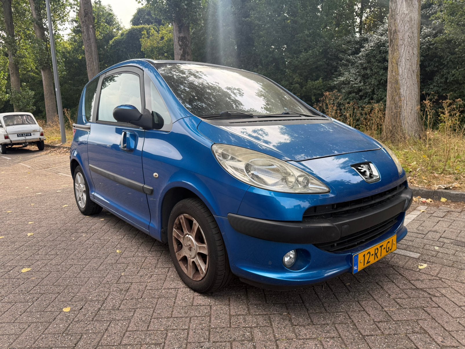 Peugeot 1007 1.4 2005 Blauw, Auto's, Peugeot, Voorwielaandrijving, Stof, 1360 cc, 4 cilinders