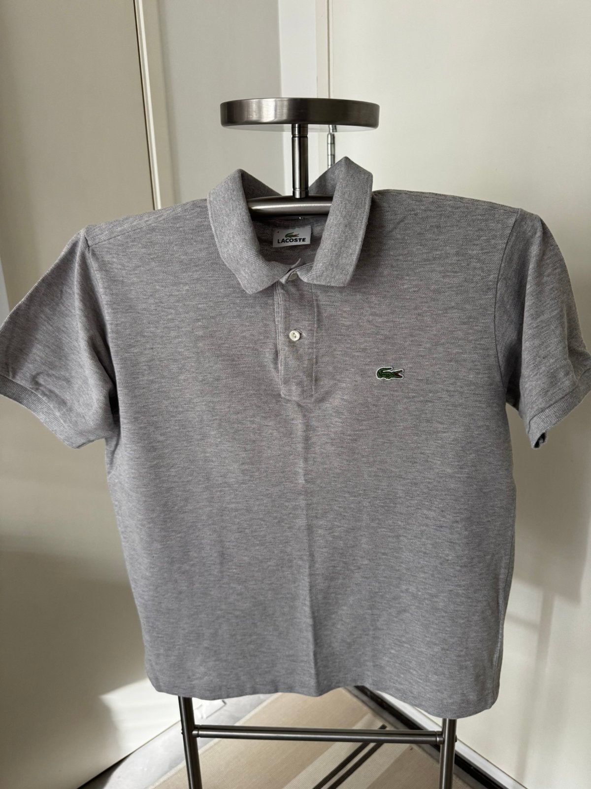 Polo T- Shirt by Lacoste/ Grey, Ophalen of Verzenden, Zo goed als nieuw, Maat 48/50 (M), Grijs