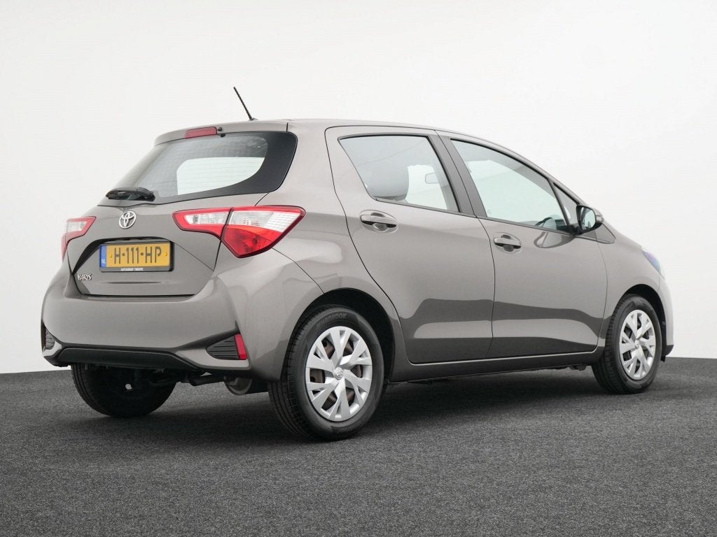Toyota Yaris 1.0 VVT-i Comfort | Airco | Bluetooth | Dealer, 21 km/l, Stof, 730 kg, Bedrijf