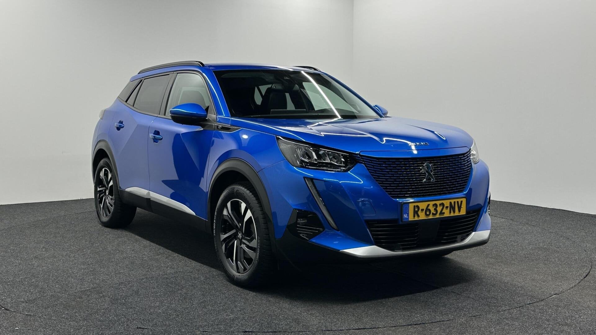 Peugeot e-2008 EV Allure Pack 50 kWh TREKHAAK 360 CAMERA NAV, Auto's, 136 pk, Gebruikt, Met garantie (alle), Blauw