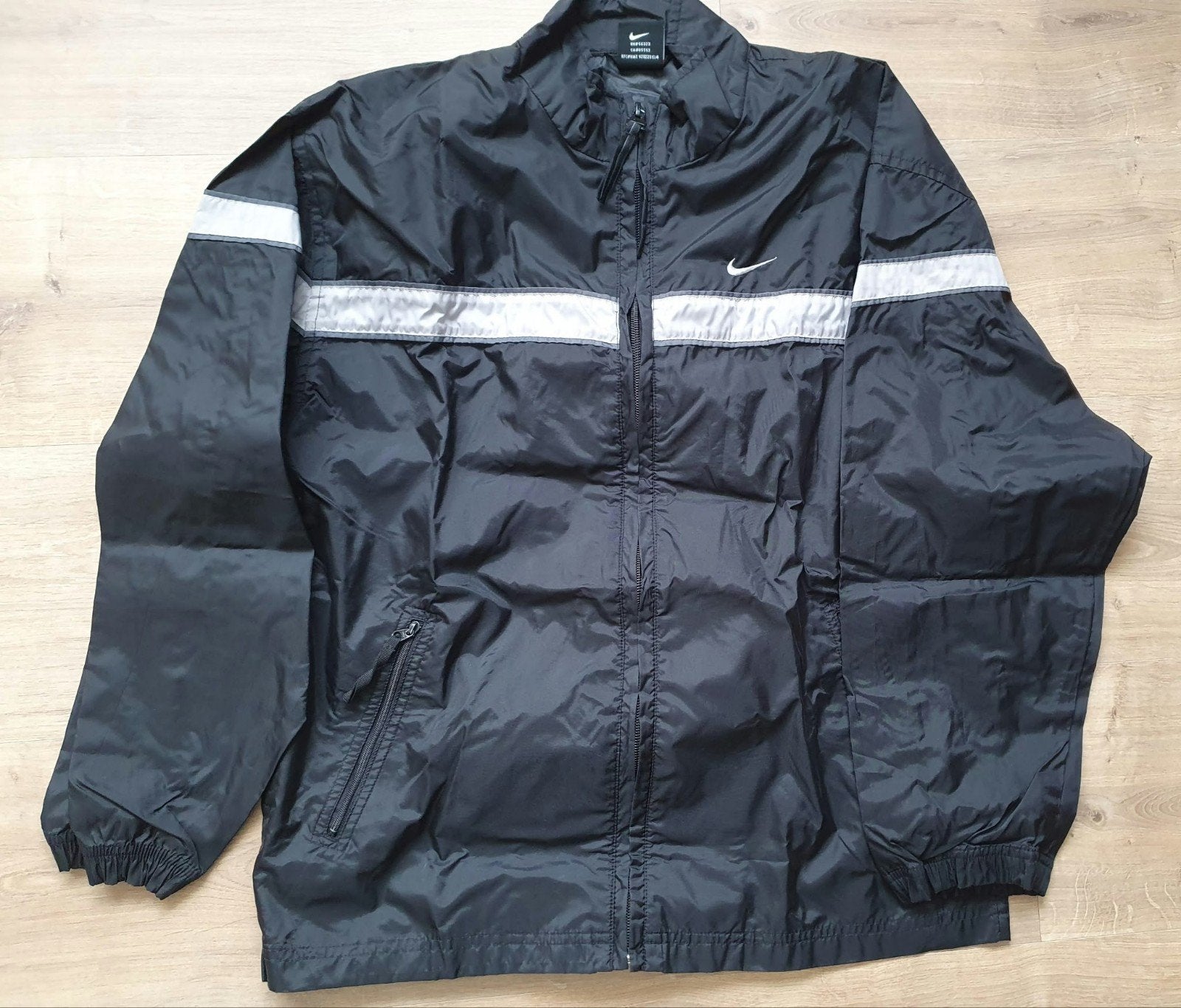 152-158 Zwarte Nike regenjas, Kinderen en Baby's, Kinderkleding | Maat 152, Ophalen of Verzenden, Zo goed als nieuw, Jongen of Meisje