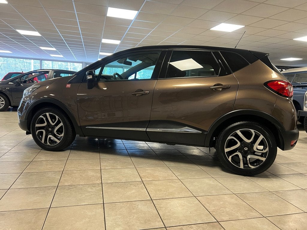 Renault Captur 1.2 TCe Helly Hansen Automaat, Lederen bekled, Euro 5, Zwart, 4 cilinders, Bruin