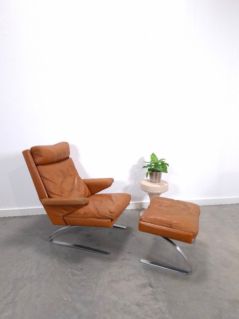 Vintage COR Swing fauteuil met hocker, Reinhold Adolf, leer, Gebruikt, 75 tot 100 cm, Ophalen of Verzenden, Vintage leren fauteuil met poef