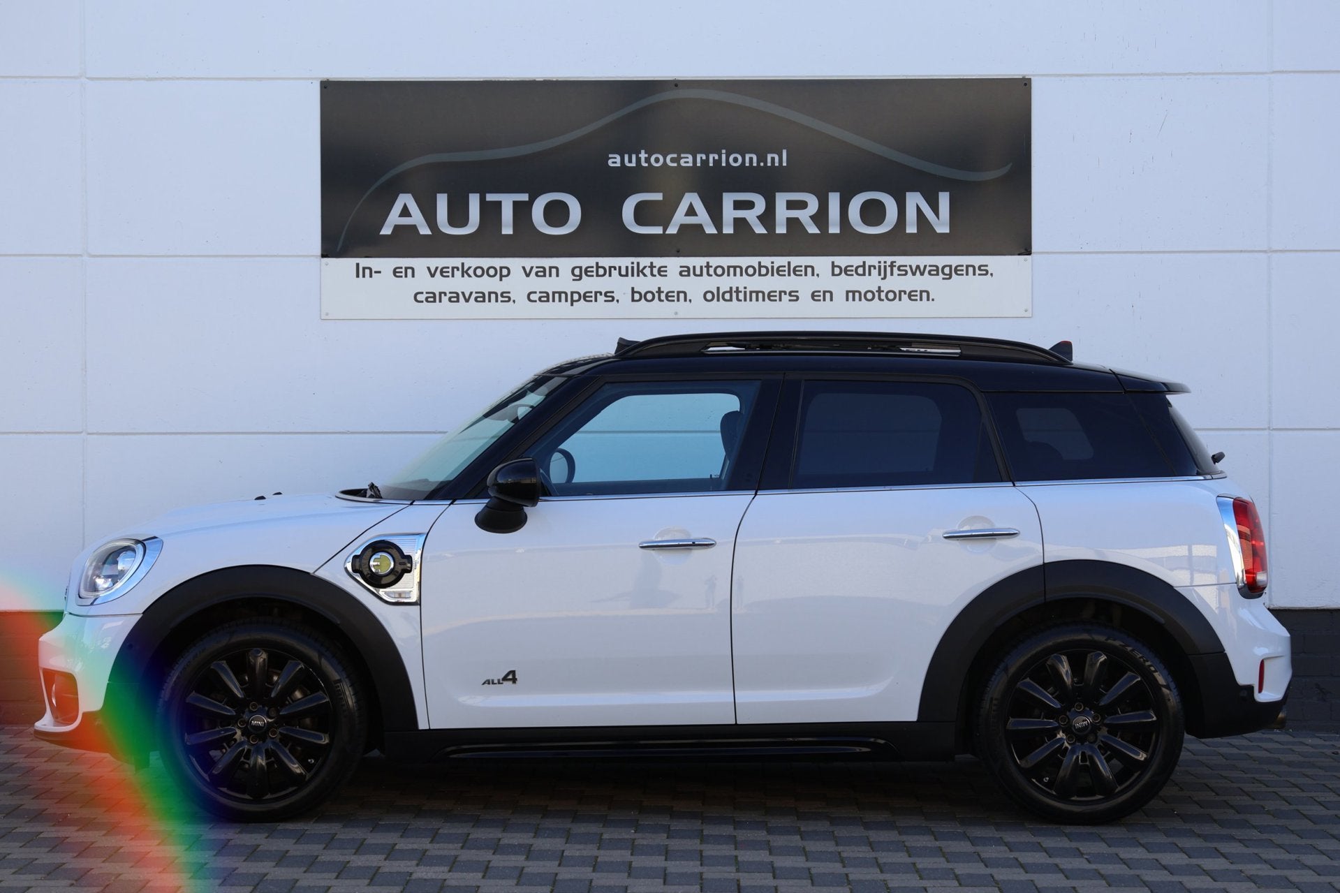 Mini Countryman 1.5 Cooper S E ALL4 Pano Navi Camera LED !, Auto's, Automaat, Gebruikt, Zwart, Leder en Stof