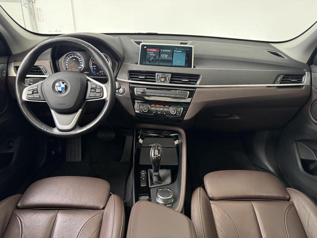 BMW X1 sDrive20i High Executive | Panoramadak | Trekhaak | L, Auto's, BMW, 1998 cc, Met garantie (alle), Wit, 1455 kg