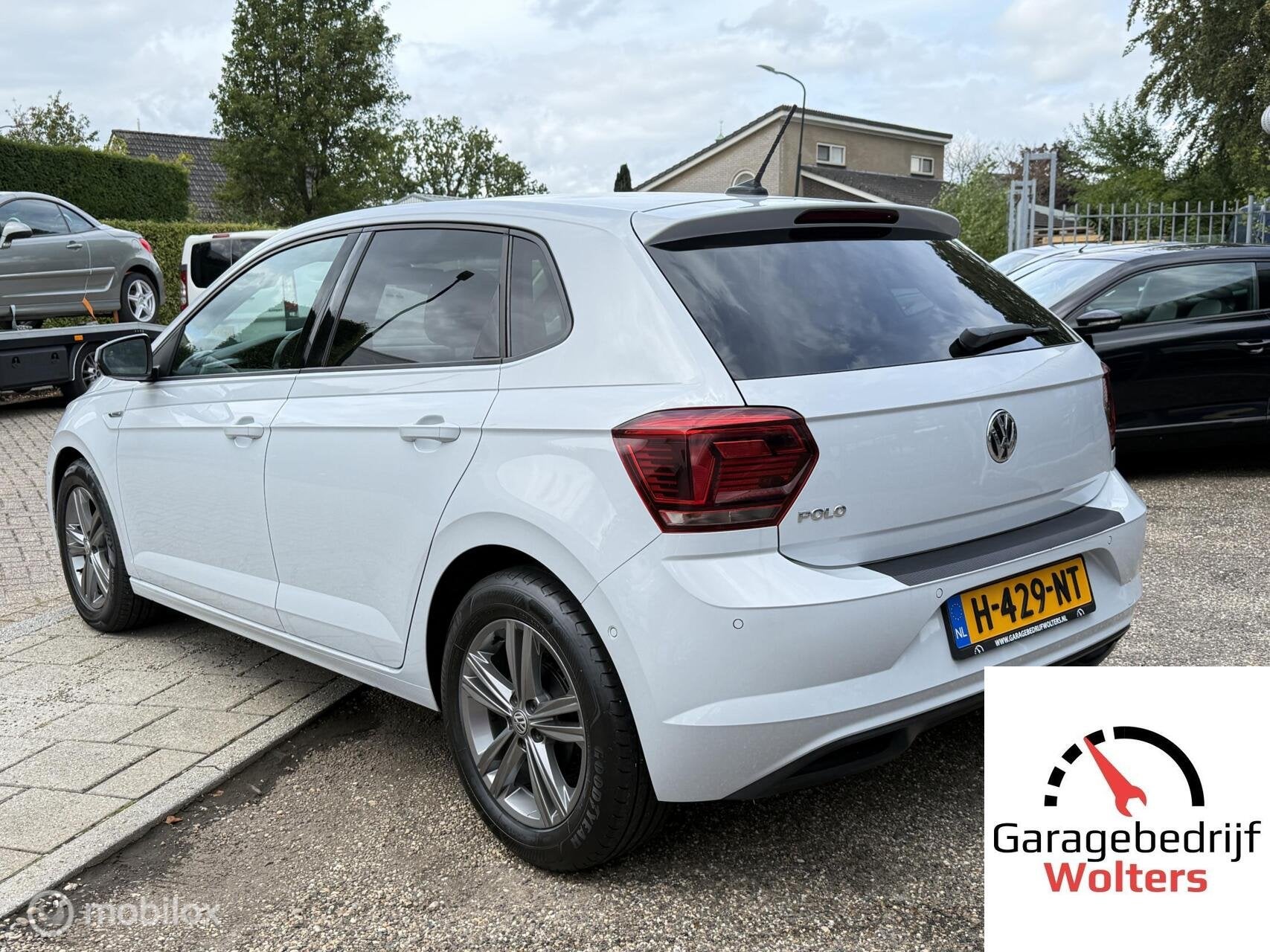 Volkswagen Polo 1.0 TSI Highline R-LINE AUTOMAAT STOELVERWAR, Auto's, Stof, Gebruikt, 95 pk, Met garantie (alle)