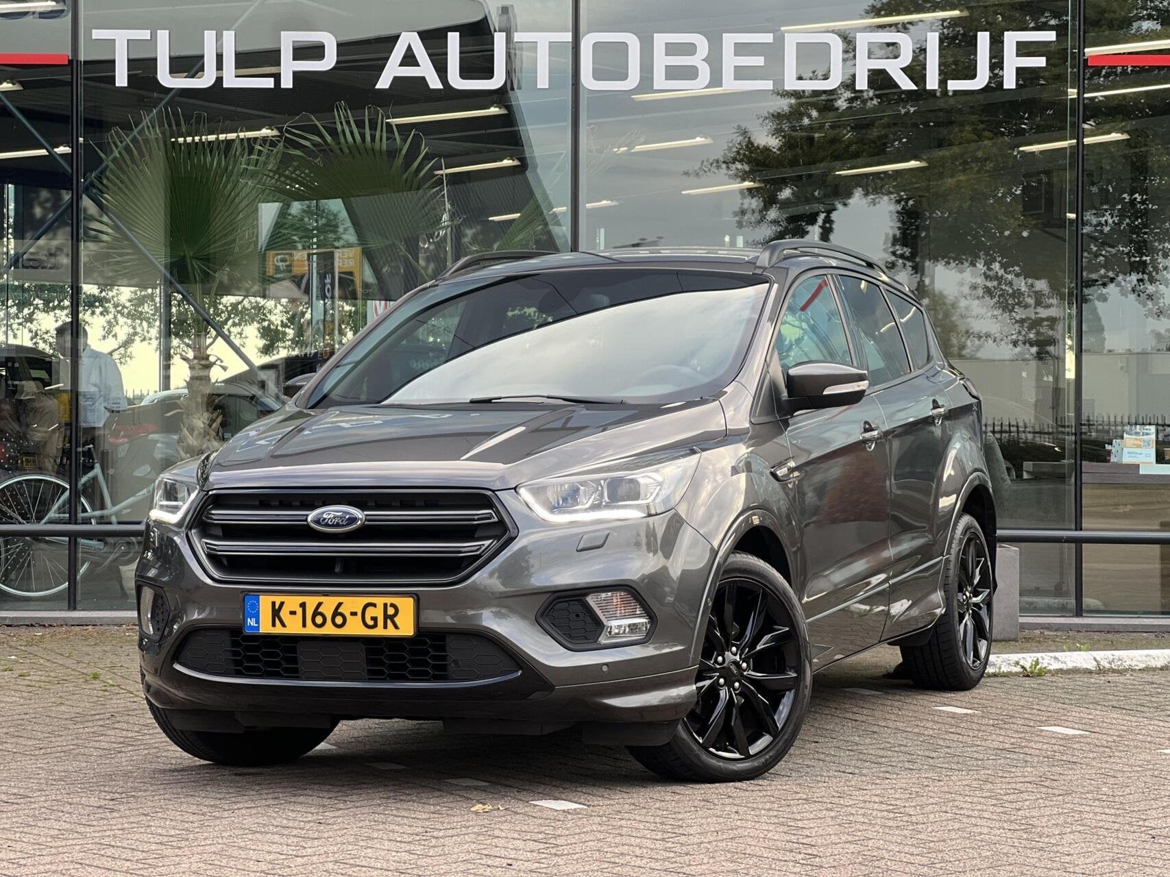 Ford Kuga 1.5 EcoBoost ST Line Clima Cruise Winterpack Trekh, Auto's, Dealer onderhouden, 4 cilinders, Bedrijf, Handgeschakeld