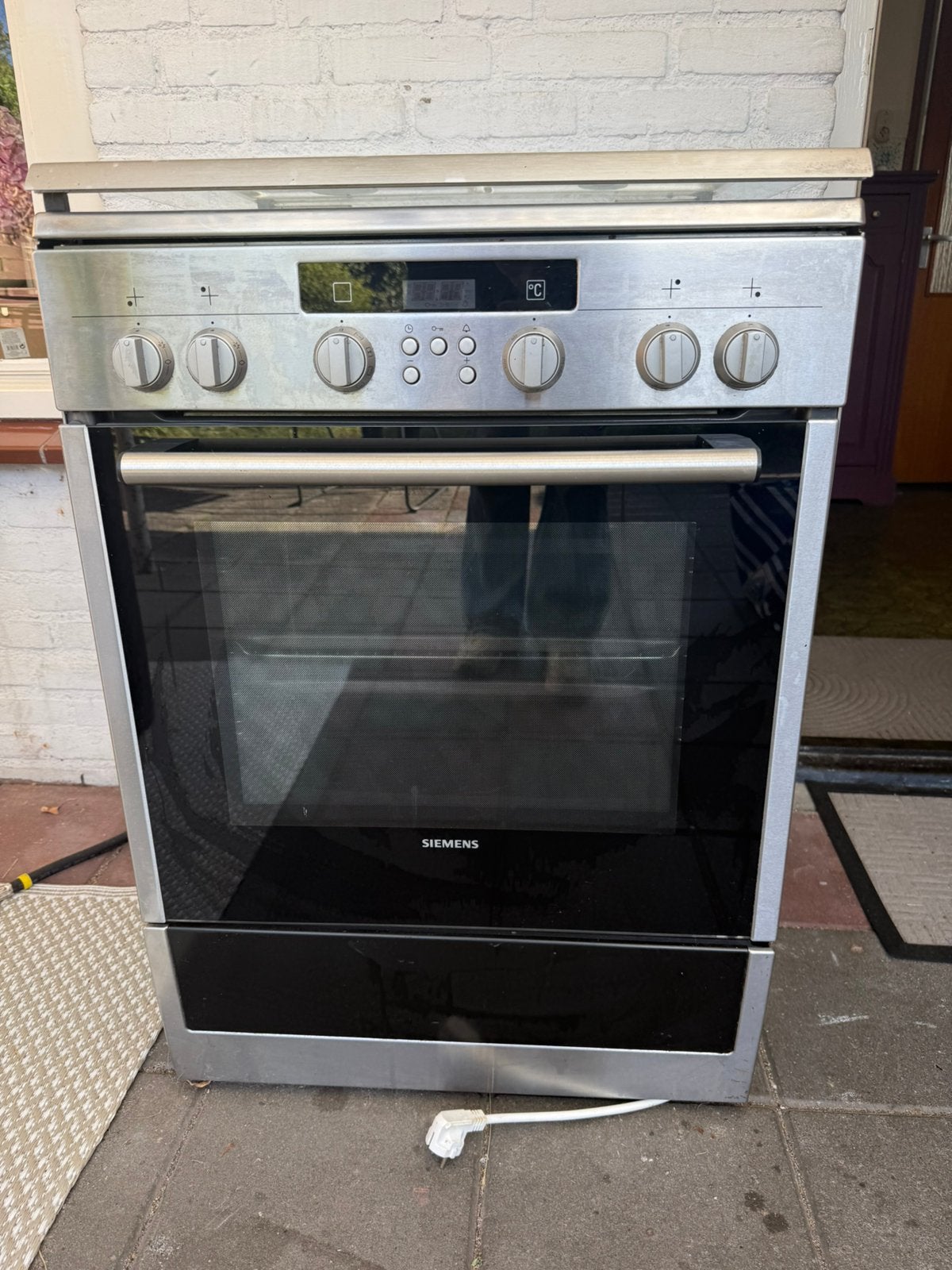 Siemens RVS gasfornuis met oven – 4 pits, Ophalen, 4 kookzones, Zo goed als nieuw, Gas