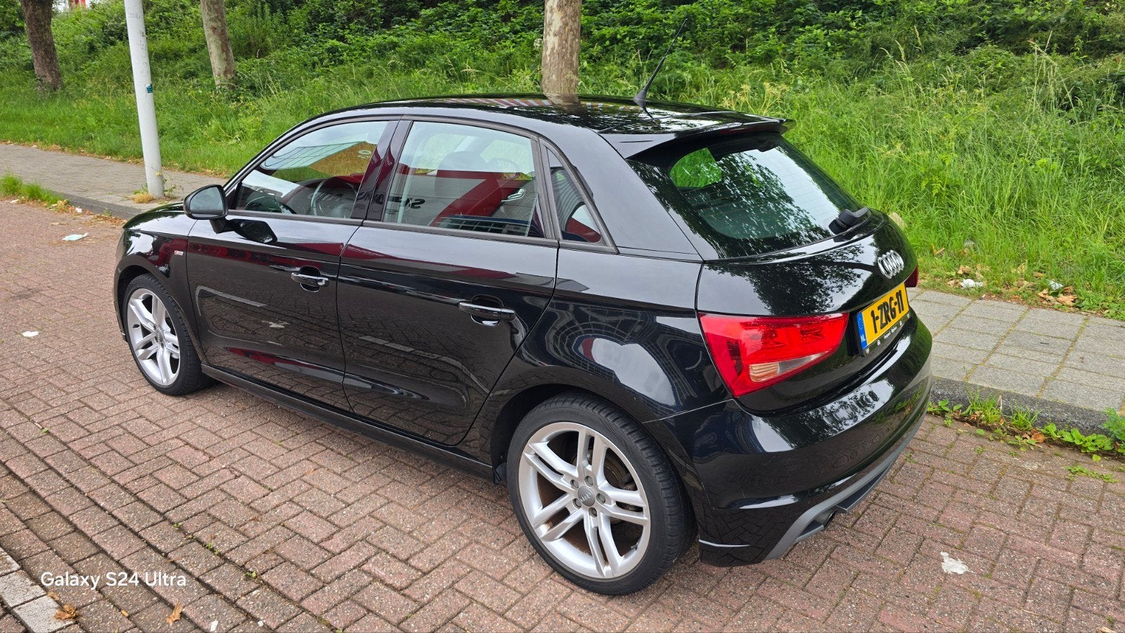 Audi A1 1.2 Tfsi 63KW SB Sline 2015 Zwart, Auto's, Audi, Voorwielaandrijving, Euro 5, 4 cilinders, Leder en Stof